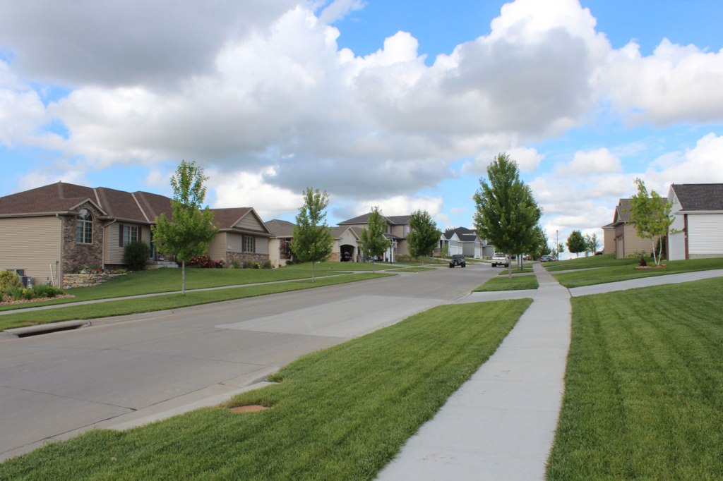 A view of some First Addition homes from the sidewalk